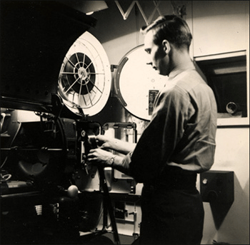 Bill Kanoy operating movie projector